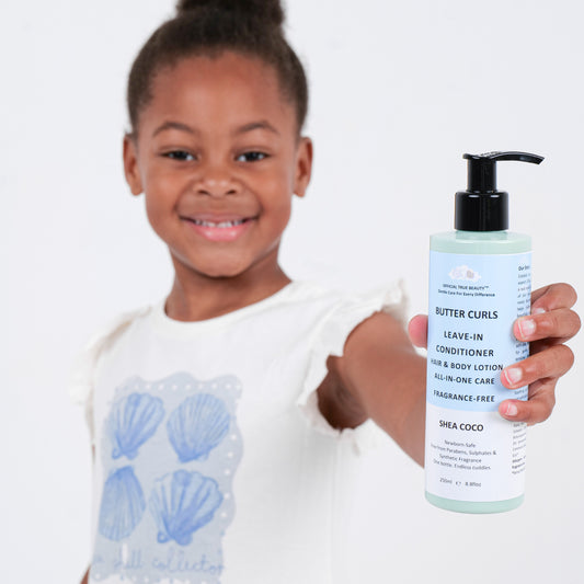 Child holding a bottle of 'Butter Curls' leave-in conditioner Shea Coco Fragrance Free