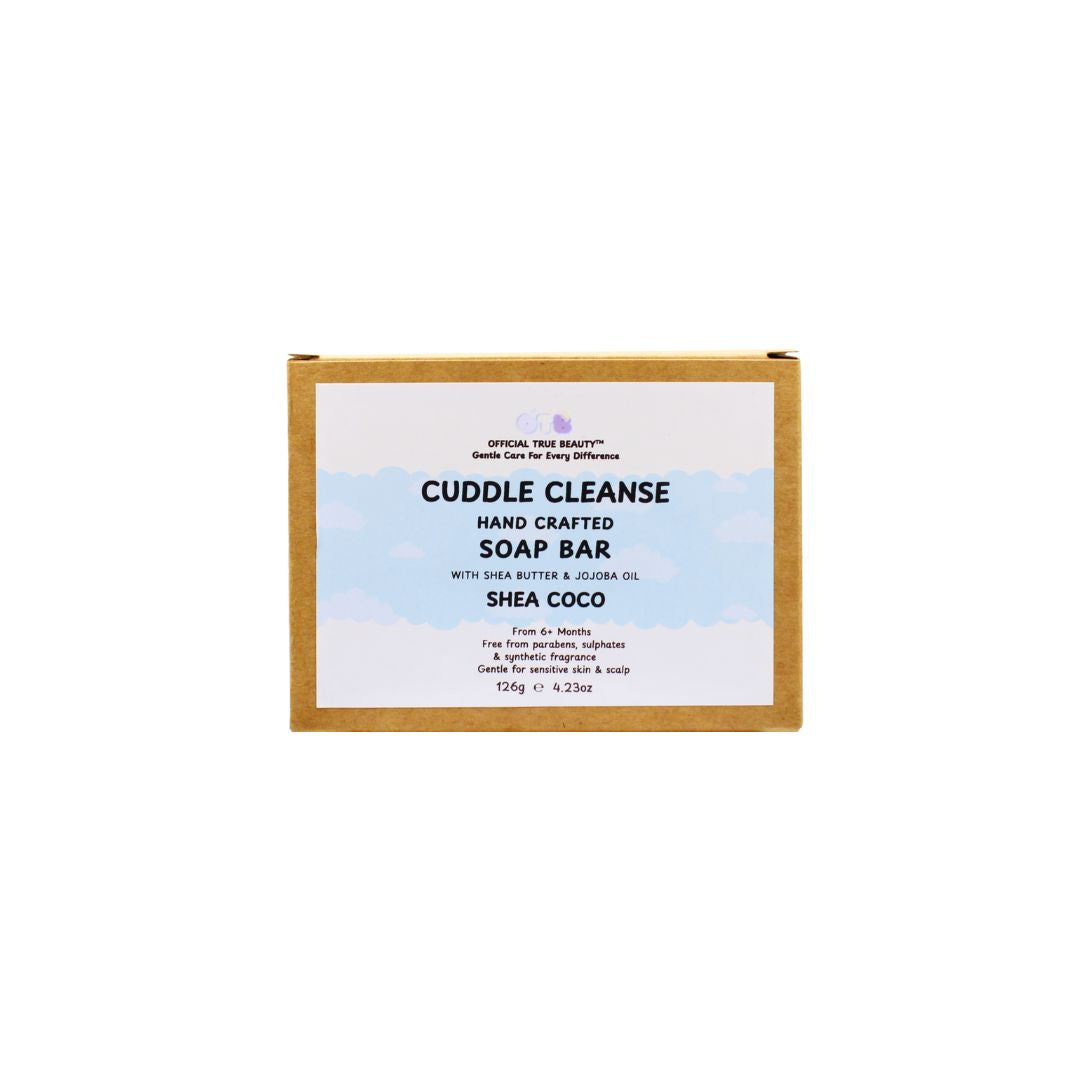 Handcrafted soap bar packaging with 'Cuddle Cleanse' branding on a white background