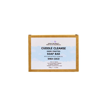 Handcrafted soap bar packaging with 'Cuddle Cleanse' branding on a white background