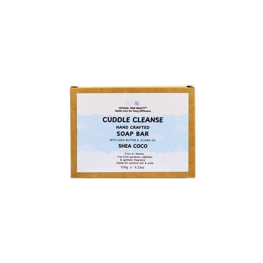 Handcrafted soap bar packaging with 'Cuddle Cleanse' branding on a white background