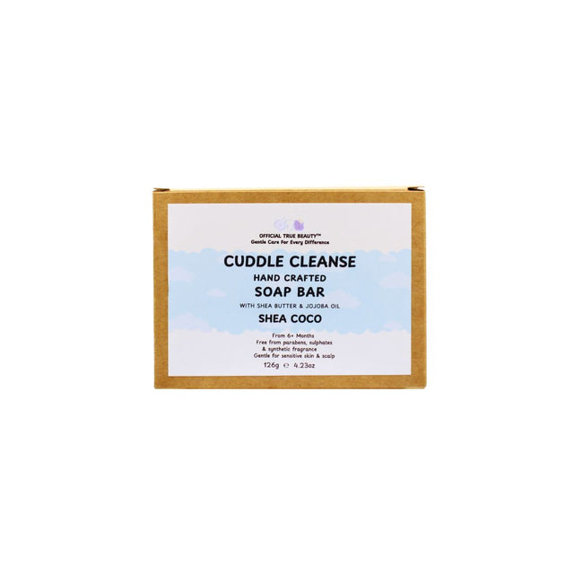 Handcrafted soap bar packaging with 'Cuddle Cleanse' branding on a white background